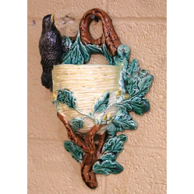 Decorate a kitchen, garden room, or covered patio wall with this charming antique French barbotine wall pocket. Crafted in...