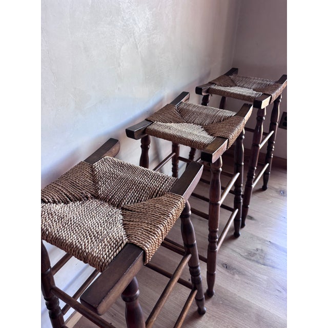Set of 3 Mid Century Bar Stools Primitive Craft Movement Turned Walnut Bobbin Spindle Legs and Danish Cording Woven Seats For Sale - Image 11 of 13