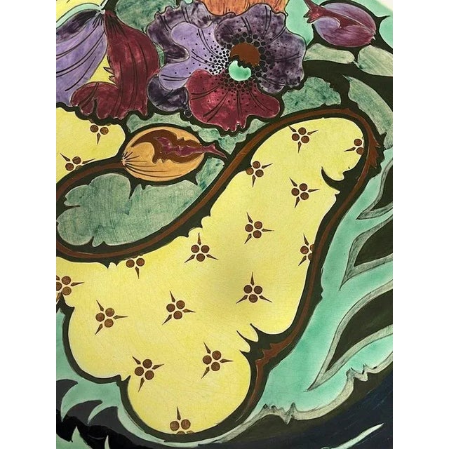 Large art nouveau gouda zuid holland plateel charger, 1901-1903 a ceramic charger measuring 38 cm diagonal, made in the...