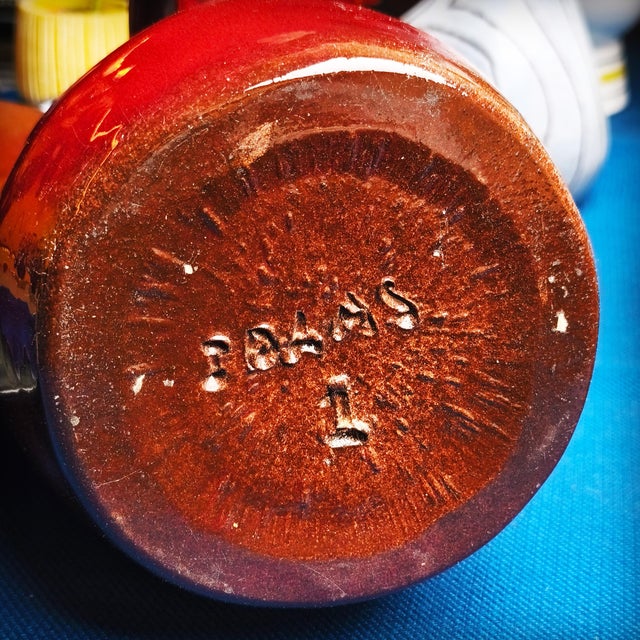 Large oxblood-speckled glazed ceramic pitcher by Max Idlas, a French ceramist from the 1960s/70s. In excellent condition....