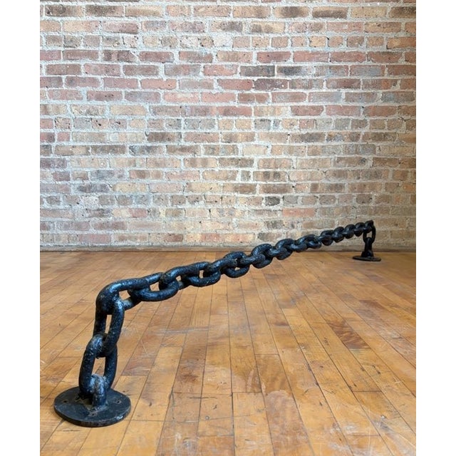 Very cool 20th-century industrial architectural rail made with a heavy-duty chain link design, welded into a fixed, rigid...