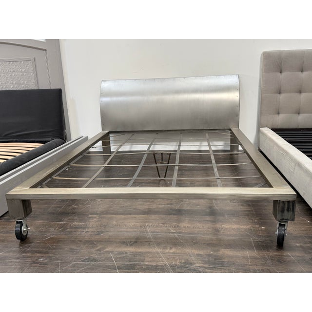 Design Plus Gallery presents a Queen Size Steel Bed Frame. The industrial-style design is constructed from steel and...