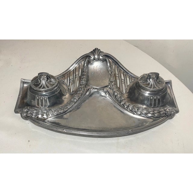 Up for sale is a very nice quality 19th century antique Empire Style dual inkwell stand. It's made of a silver-plated...