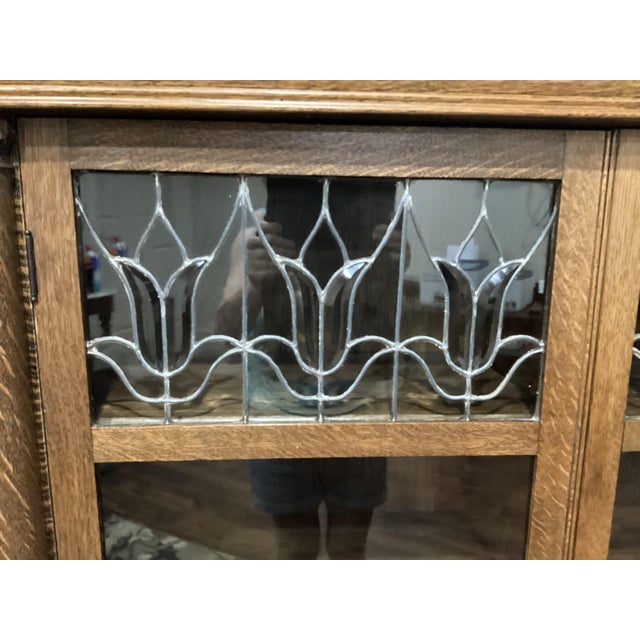 Arts & Craft Antique Oak Bookcase Double Doors Lead-Glass Tulips Claw Feet on Rollers For Sale - Image 4 of 12