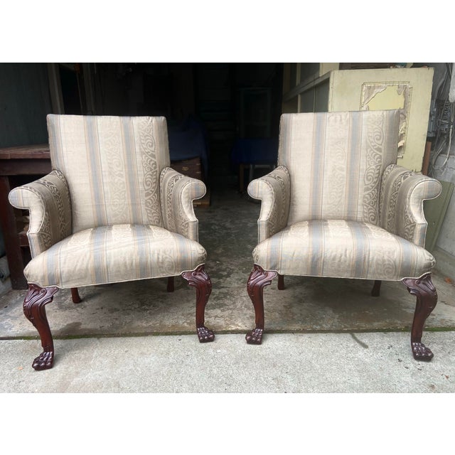 Handsome pair of vintage chairs with silk striped Damask upholstery. Chairs are a smaller scale and depending on the new...