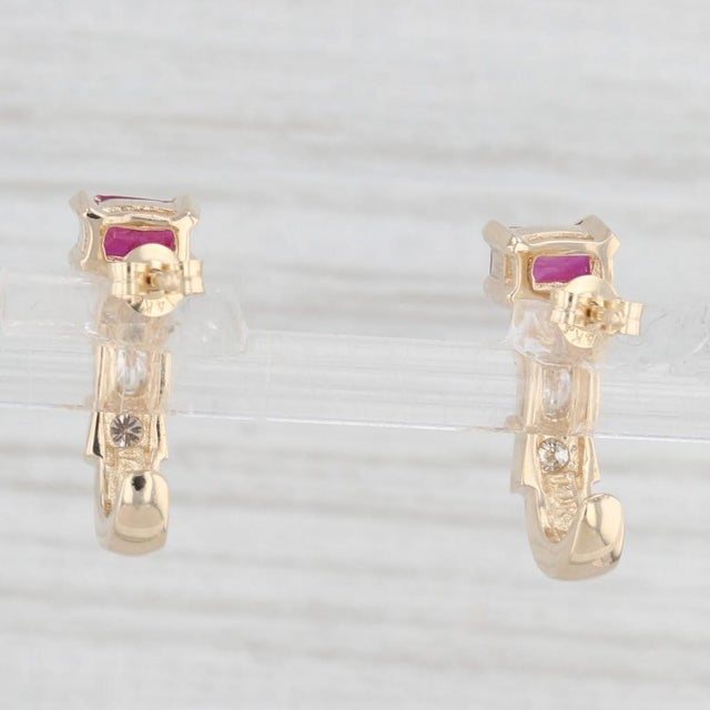 Gemstone Information: - Natural Rubies - Total Carats - 0.78ctw Cut - Emerald Color - Red Treatment - Routinely Enhanced -...