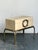 This sophisticated vintage brass and parchment box on a chrome stand is crafted in the distinctive style after Karl...