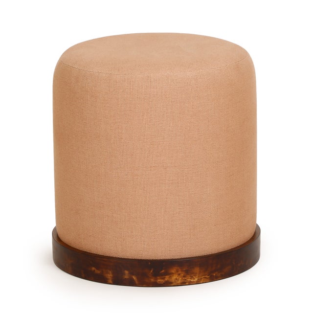 The Como Stool brings rich texture and grounded warmth to any space. A dark burl-finished base anchors the piece, while...