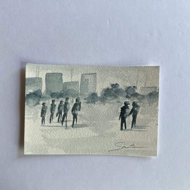 A walk with the city as a backdrop. Signed and ready to frame.