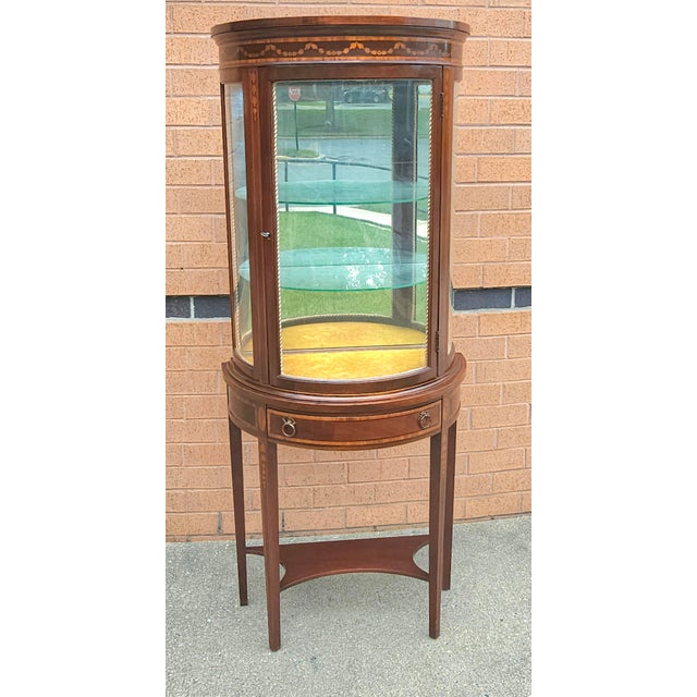Italian Louis XV Style Marquetry Inlaid Mahogany Vitrine Cabinet. Two adjustable height glass shelves. Yellow Velvet...
