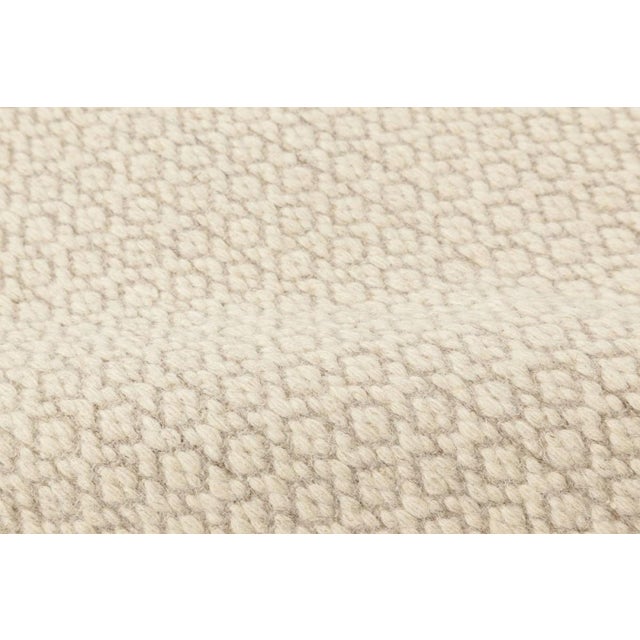 Modern solid beige flat-weave rug by Doris Leslie Blau Size: 13'0" × 18'0" (396 × 548 cm) This subtle and imposing modern...