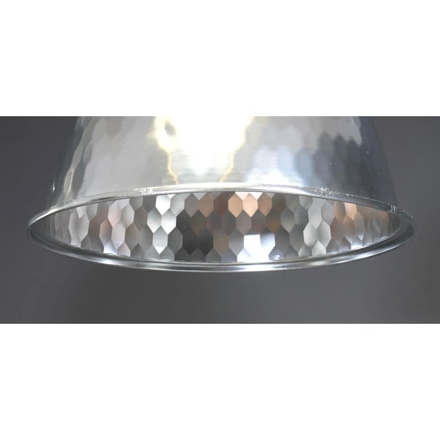 This big ceiling lamp was produced in 1980. It is made from polished aluminium. European Plug (up to 250V).The wiring of...