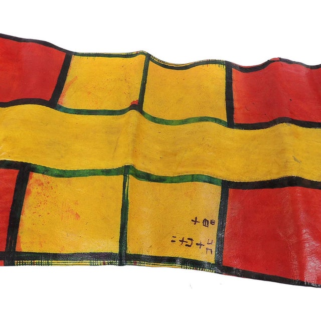 This panel made of leather comes from the Tuareg a nomadic people living in a number of countries including Mali, Niger,...