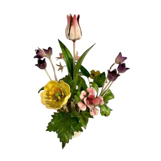 A charming, vintage tole floral arrangement. Features gorgeous, colorfully hued blooms accented by green leaves and stems...