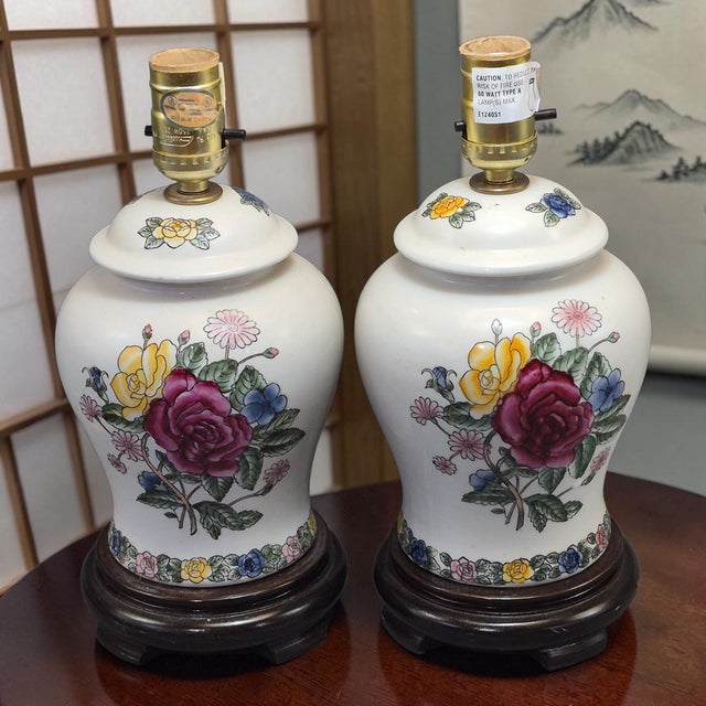 This pair of vintage boudoir table lamps is a charming addition to any romantic-inspired decor. Made of porcelain and...