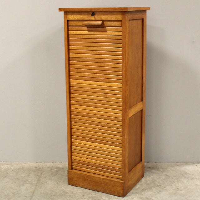 Single-shutter filing cabinet Made of oak Early 1900s Dimensions: width 48 cm, depth 38 cm, height 120 cm Restored (see...