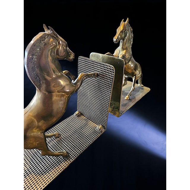Substantial vintage solid brass horse bookends featuring a classic rearing horse design. These are heavy, well-cast pieces...