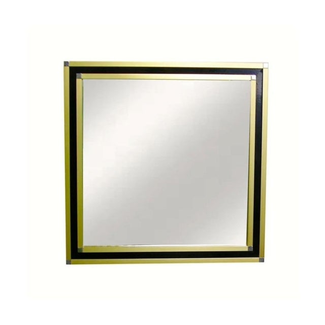 Mid-century modern Italian wall mirror designed and produced by Mario Sabot in the 1970s, featuring a refined geometric...