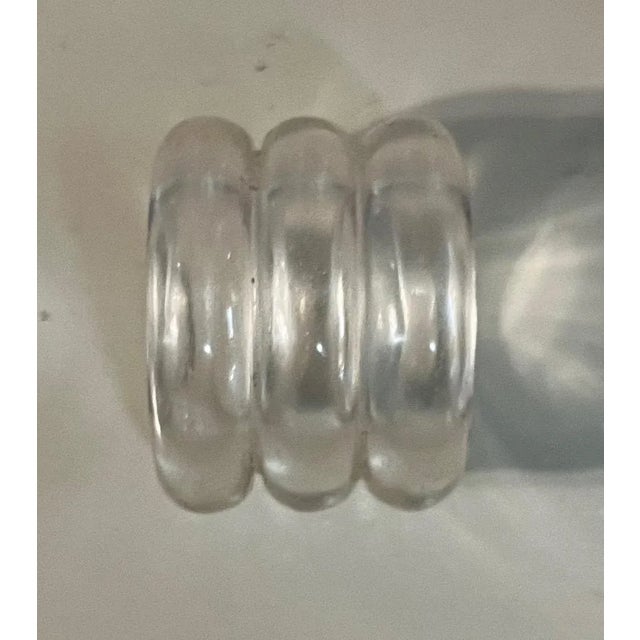 Chinese carved rock crystal archer's ring. Measures 1 1/4" diameter x 1" tall. Dates from the early 20th century. Good...