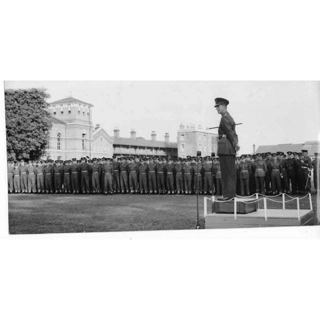 1953 black and white photo of Prince Philip addressing a Battalion of the Welsh Guards at Windsor Castle. Publication...