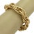 This is a large vintage bracelet, from 18k yellow gold ( links are hollow) with polished and textured links all interlaced...