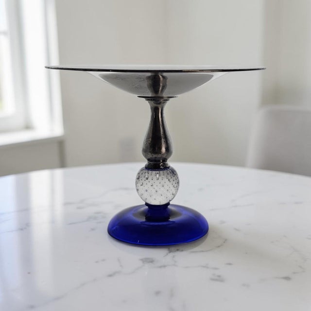 This Pairpoint Manufacturing Company tazza or comport was produced in New Bedford, Massachusetts, United States, circa...