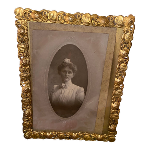 Antique Photo Frame . Antique Gilded Frame With an Oval Victorian Cabinet Card Portrait.