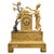Early 19th Century French Empire Gilt and Silvered Bronze Mantel Clock : Decorative and finely detailed Empire-style...