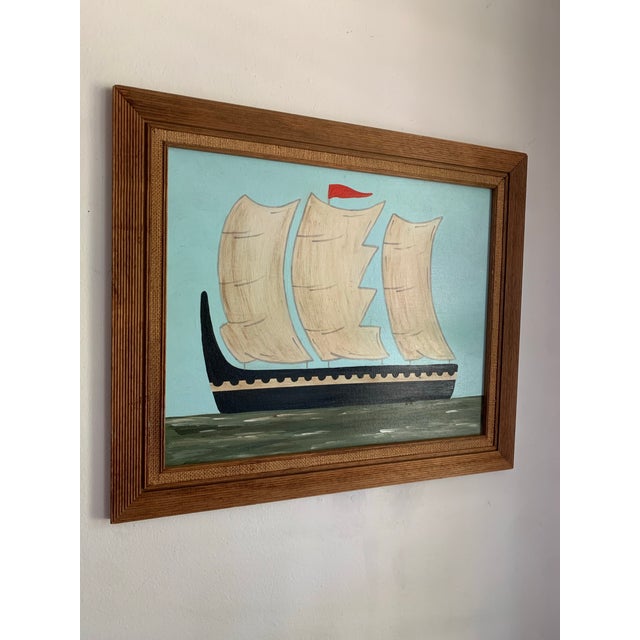 This seascape pairs a robin’s egg blue sky with an avocado green foreground and black vessel, softened by off-white sails....