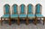 This is a stunning set of five vintage Mission / Arts & Crafts oak dining chairs featuring tall arched backs with...