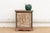 This charming bedside cabinet is a masterclass in giving new life to old history. Constructed from the remnants of an...