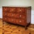Chest of drawers with three drawers and a straight carcass. The carcass is veneered in cherry wood and fitted with...