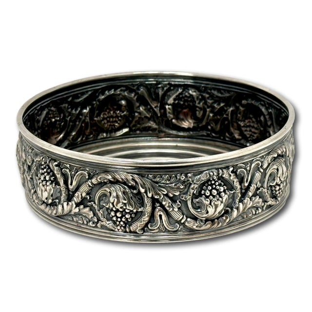 This is a Absolutely Beautiful & Very Fine Quality Antique Silverplate Wine Bottle Coaster. It is Rendered in a Classic...