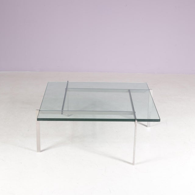 This 1970s coffee table is designed in the style of Poul Kjærholm’s iconic PK61 model. Characterised by its minimalist...