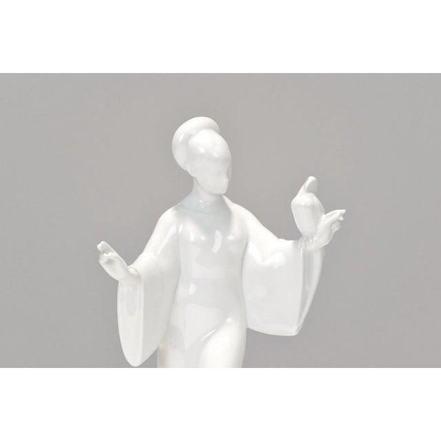 The monumental wedding procession by adolph amberg is a royal table decoration with porcelain figurines, designed for the...