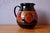 This pitcher draws its inspiration from the great traditions of handcrafted pottery and embodies the creative warmth of...