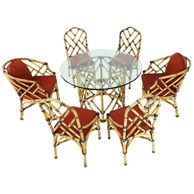 Mid-Century Modern round glass top dining table six chairs bamboo dining set by McGuire. Outstanding craftsmanship all...