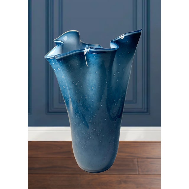 This stunning 14 ½-inch tall Murano art glass vase is a true masterpiece, meticulously hand-blown by Italy’s most skilled...