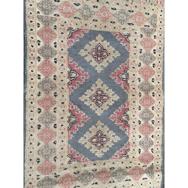 Pretty small vintage Pakistani rug with nice geometrical design in style of Turkmen rugs, and beautiful colours with pink,...