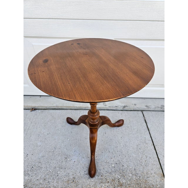 This round Pine Shop Original table is 18 inches in diameter and 22.25 inches in height. The grainy pine has a warm and...