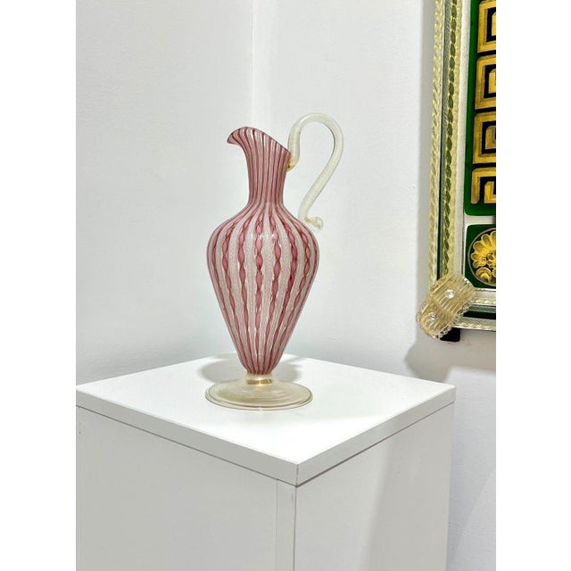 Spectacular example of Murano Glass using the latticino treatment of caned glass. A perfect and rare piece of glass which...