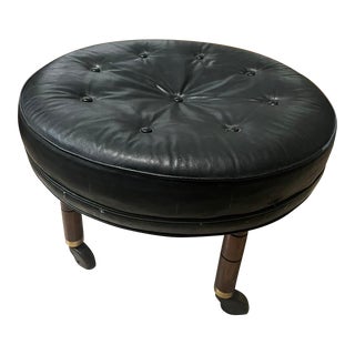 Mid 20th Century Vintage Baker Round Black Tufted Leather Ottoman on Casters For Sale