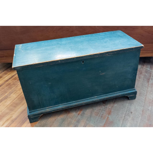We are selling this gorgeous looking 18th century American blanket chest. This blanket chest has dark turquoise blue paint...