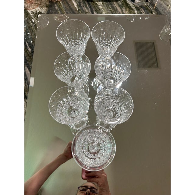 Set of seven beautiful crystal wine glasses with an unusual cut crystal pattern from French maker Crystal d’Arques....