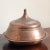Offering a beautiful Middle Eastern antique tinned copper bowl with dome lid. Hand forged and incised with clean...