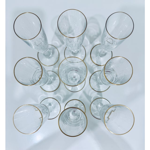 Saint-Louis Bizet Gold Crystal Champagne Flutes. Rare stunning crystal glasses with 24-carat gold detail around the rim...