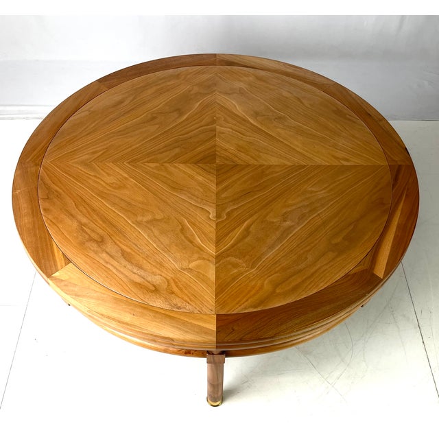 Mid-Century Modern coffee table by Medallion Limited. Crafted in wood with a distinctive grain (walnut or teak), the table...