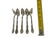 An exquisite set of five antique citrus or grapefruit spoons in the iconic "Florette" pattern, originally introduced in...