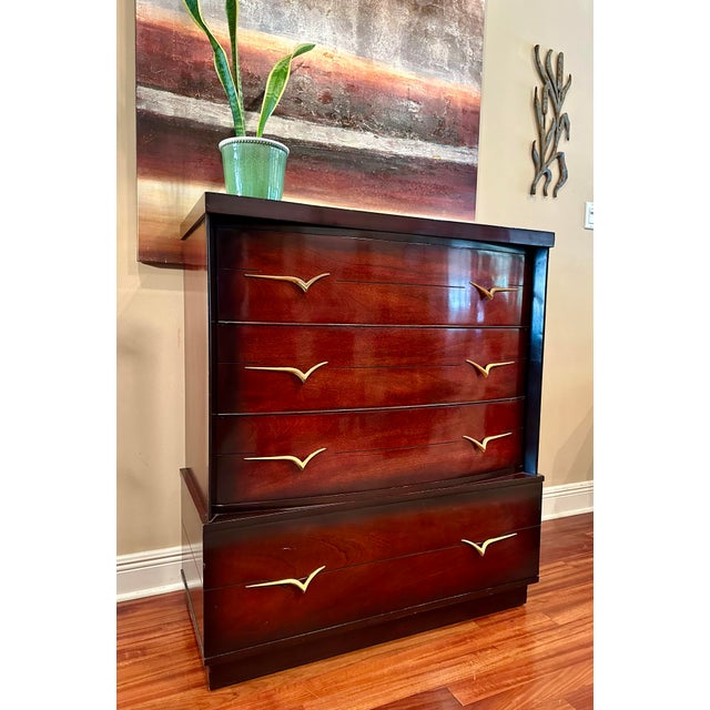 This chest is stunning! It boasts 4 drawers with the top 3 being rounded and set back. The high gloss finish along with...