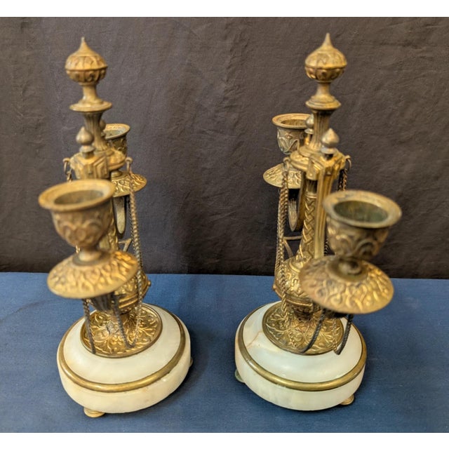 This vintage pair of 19th century bronze & marble candelabras are French in origin. They are a stunning pair of double...